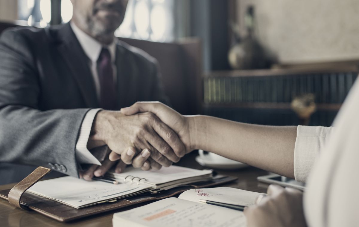Attorney meeting with a client